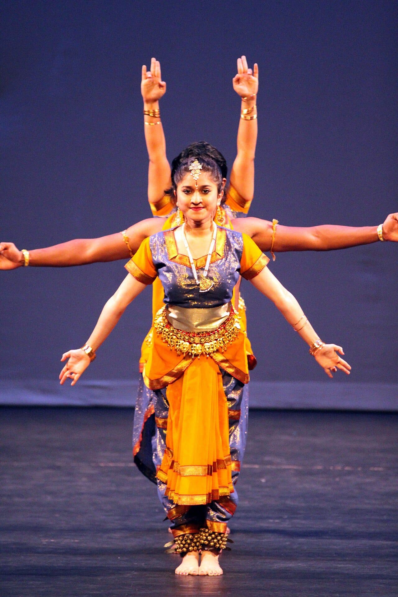 Indian dance composition using layered arms and classical line